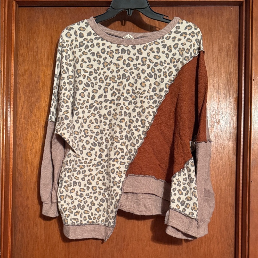 Lovely Melody Boutique Animal Print Knit Top